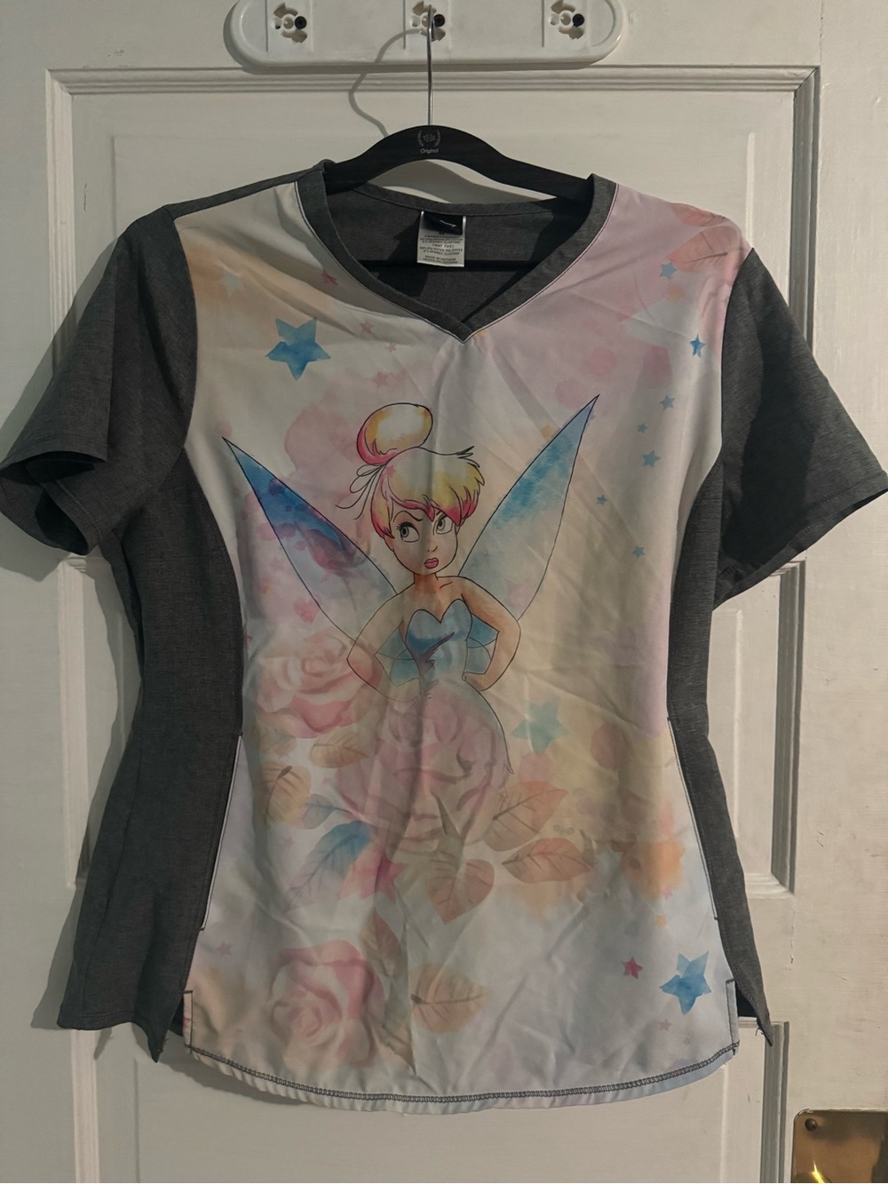 Woman’s Disney Tinkerbell medium scrub top like new, from smoke free home .